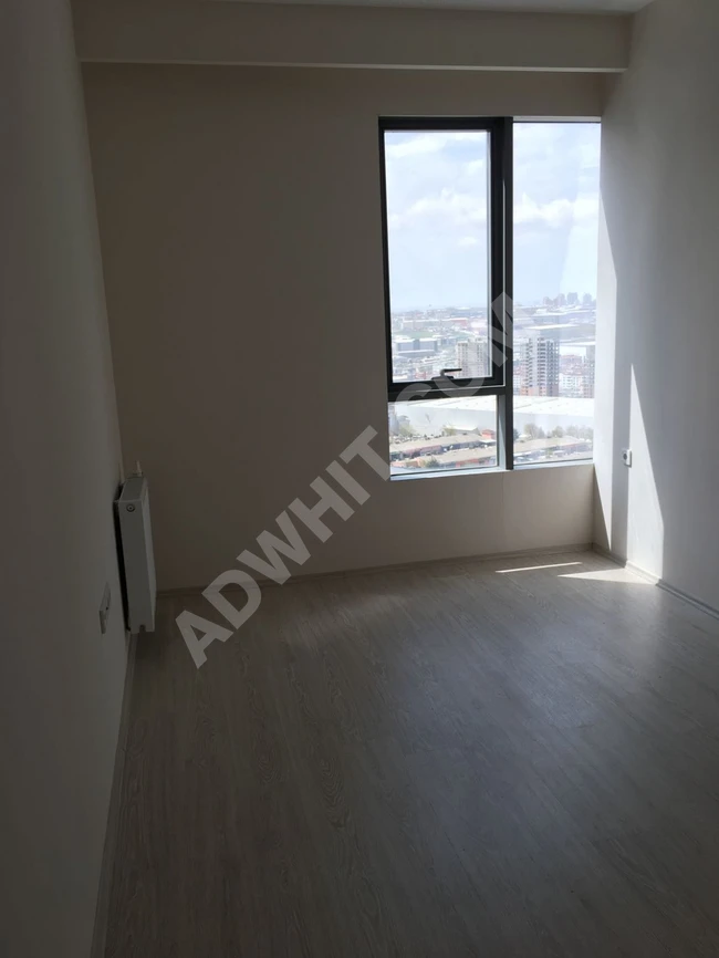 Entegre bir toplu konut içinde 1+1 aylık olarak kiralık daire