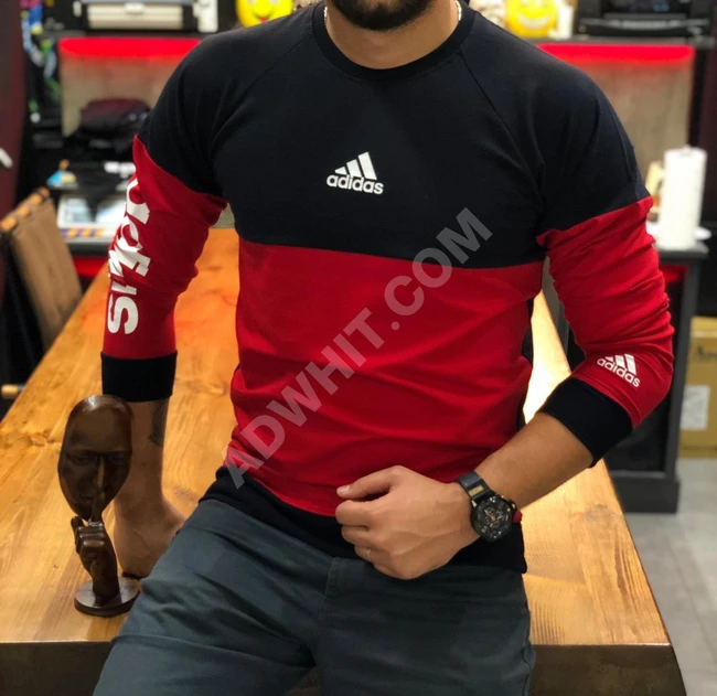 كنزة ماركة اديدس نوعيه جدا ممتازه اسعار خاصه لصحاب الكميات