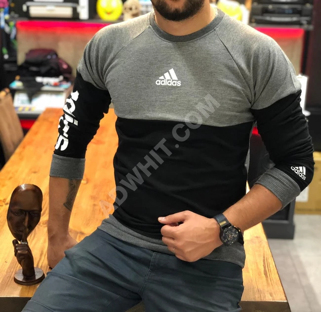 كنزة ماركة اديدس نوعيه جدا ممتازه اسعار خاصه لصحاب الكميات