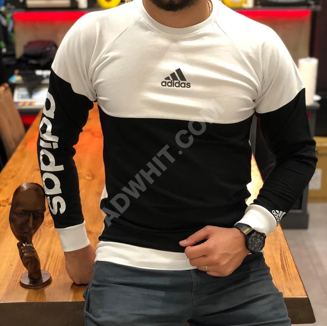 كنزة ماركة اديدس نوعيه جدا ممتازه اسعار خاصه لصحاب الكميات