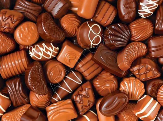 الشوكولا والحلوى (كاندي) والبسكويت والمعجنات 