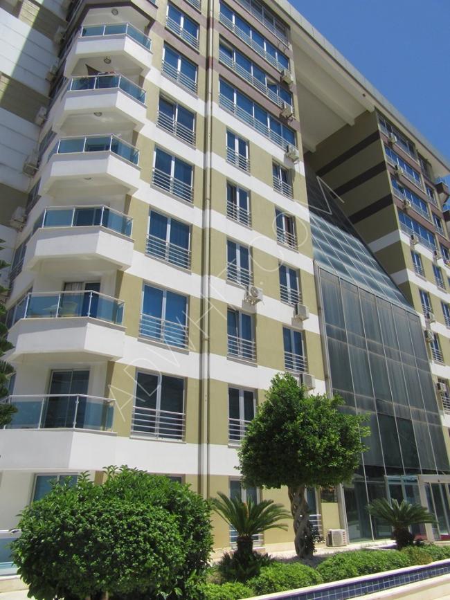 انطاليا - شقة سوبر لوكس مفروشة بالكامل ضمن مجمع متكامل للايجار 