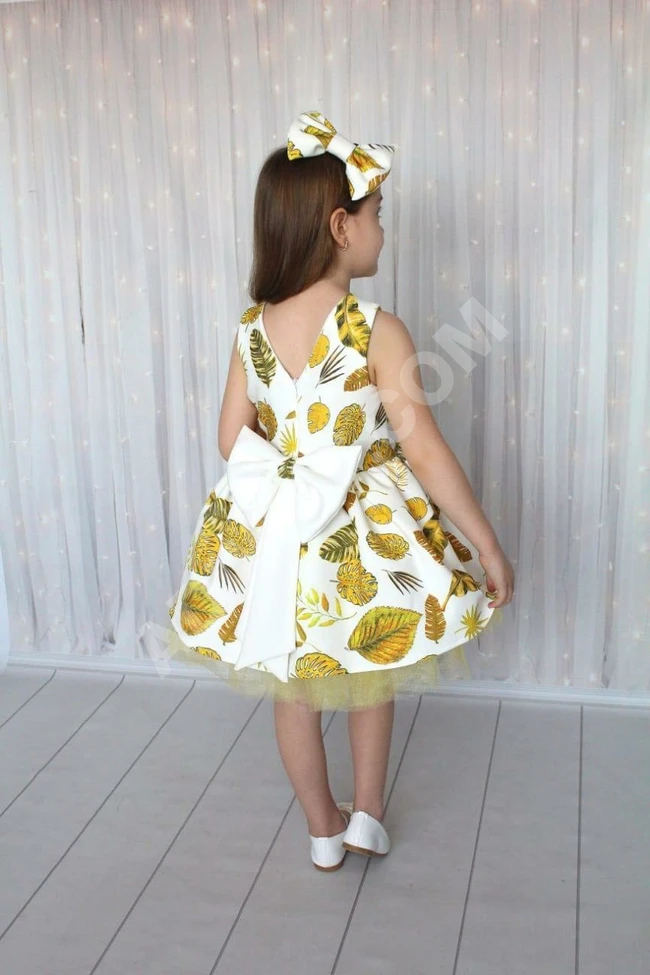 فستان بناتي مع اكسسوار للشعر 