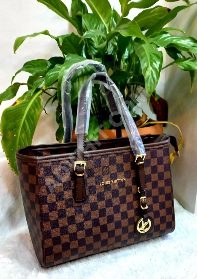 شنطة يد نسائية