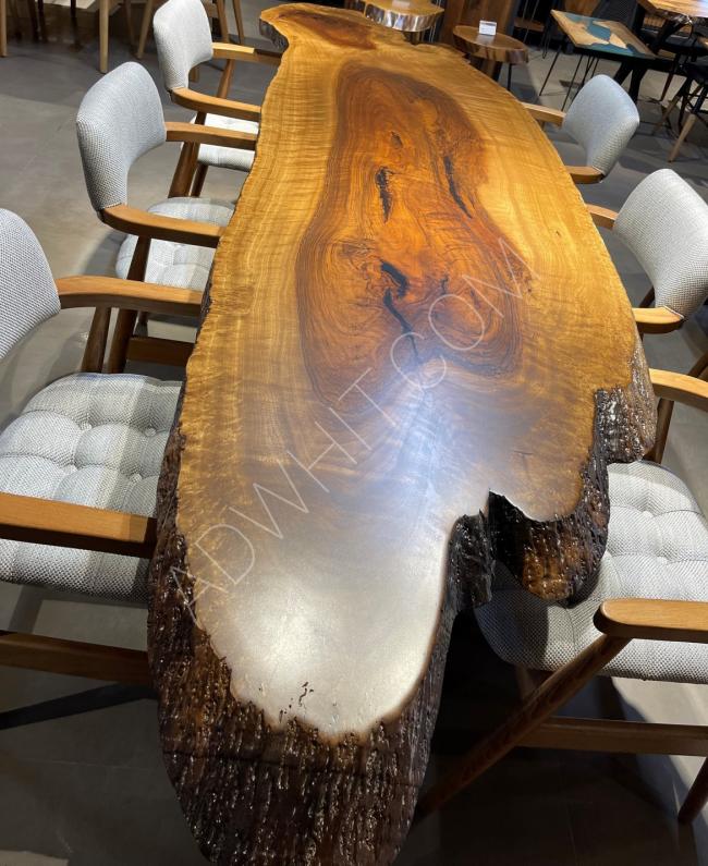 Walnut wood one-piece table covered with epoxy