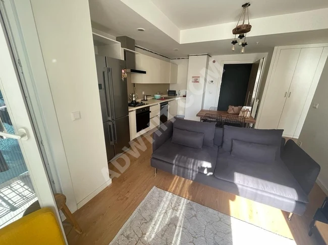 tam donanımlı bir konut sitesi içerisinde eşyalı  bir oda ve salon daire